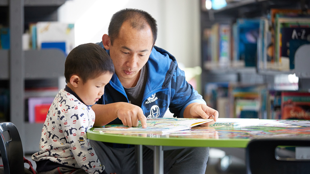 Father and child reading