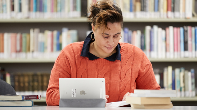 Woman studying at table