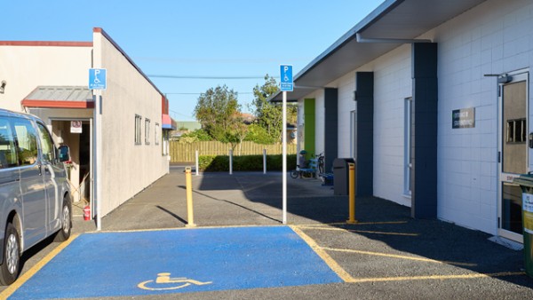 Accessible carparks are at the back of the St Andrews Library.